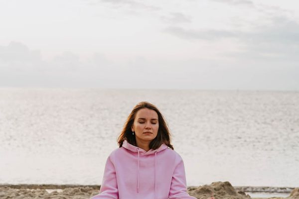 Person sitting in a peaceful meditation pose